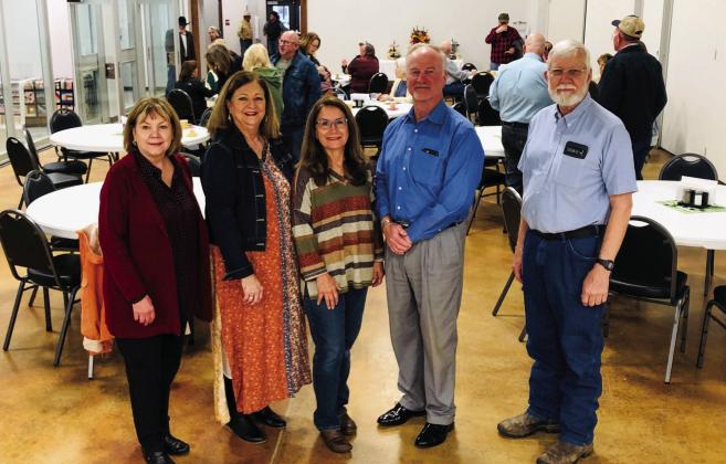 Wellington Senior Citizens Center Board of Directors, including President Peggy Allred, left, Secretary-Treasurer Margret Wood, Karen Caldwell, Richard Sims and Oran Sain, welcome visitors to the recent Open House. The Red River Sun/Bev Odom
