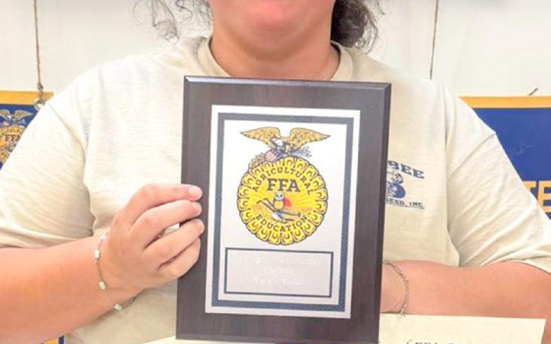 Senior Brecklyn Powell earns recognition for being a Wellington Future Farmers of America scholarship recipient. WELLINGTON HIGH SCHOOL