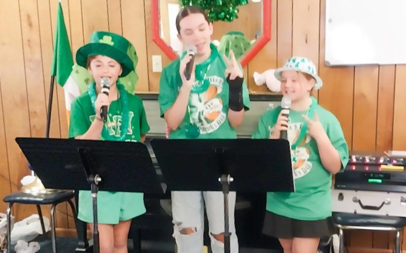 Monson Music Studio students don green for St.Patrick’s Day performance