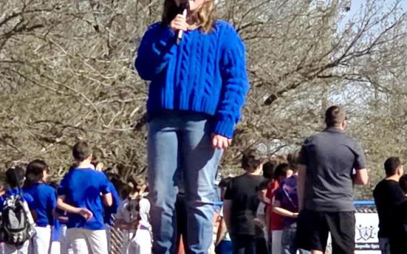 Monson Music Studio student Kinzlee Willis performs the National Anthem during the 3rd Annual Childress Little League Opening Day Fest, which included a vendor market, followed by the first games of the season, Saturday, March 26 at Rock Field. Monson Music Studio