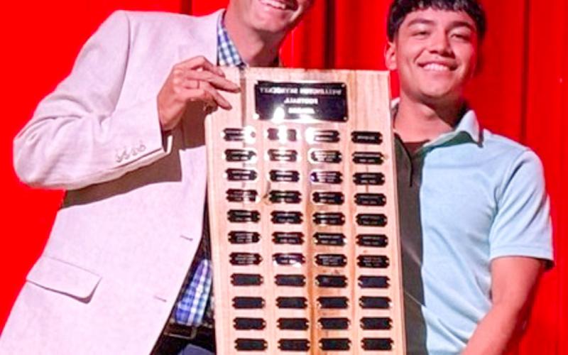 During the 6:30 p.m. Monday, May 11 Wellington High School (WHS) All-Sports Banquet at the WHS Auditorium, students received recognition for an outstanding year of Skyrocket athletics. Wellington High School senior Gustavo Soto receives the Football Defensive Lineman Award, presented by Athletic Director Greg Proffitt. SHAUNA SALINAS/THE GREENBELT INTREPID