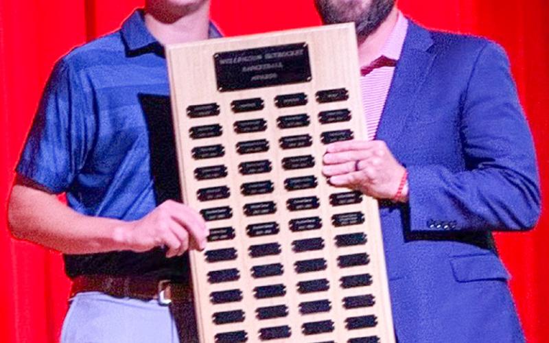 Wellington High School freshman Cix Killian garners the Boys’ Basketball Fighting Heart Award, presented by Coach Colton Holmes.