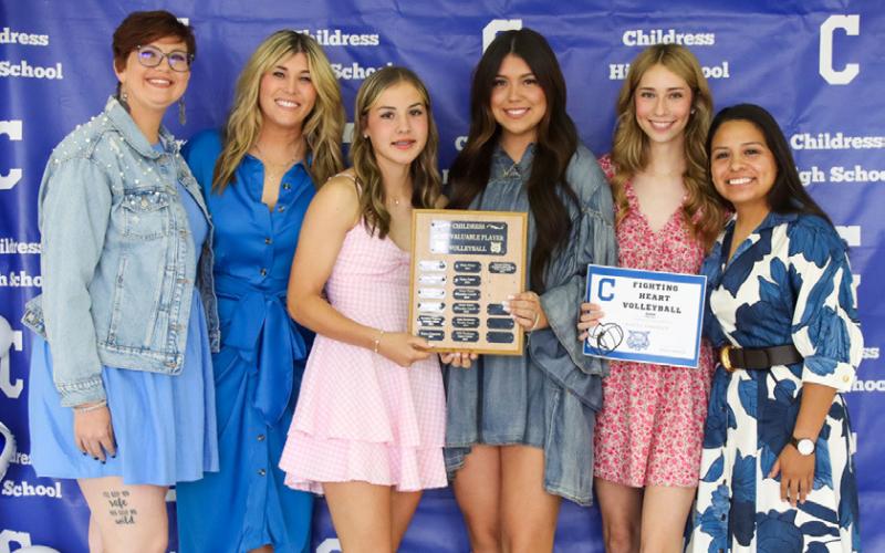 Journey Prince receives the Volleyball Offensive Most Valuable Player Award, Kinley Galligan receives the Volleyball Defensive Most Valuable Player Award and Harley Carrasco receives the Fighting Heart Award, presented by Head Volleyball Coach Charlsi Bozeman and Assistant Volleyball Coaches Bianca Garcia and Stormi Schaefer. From left: Schaefer, Bozeman, Galligan, Prince, Carrasco, Garcia. CHILDRESS HIGH SCHOOL YEARBOOK