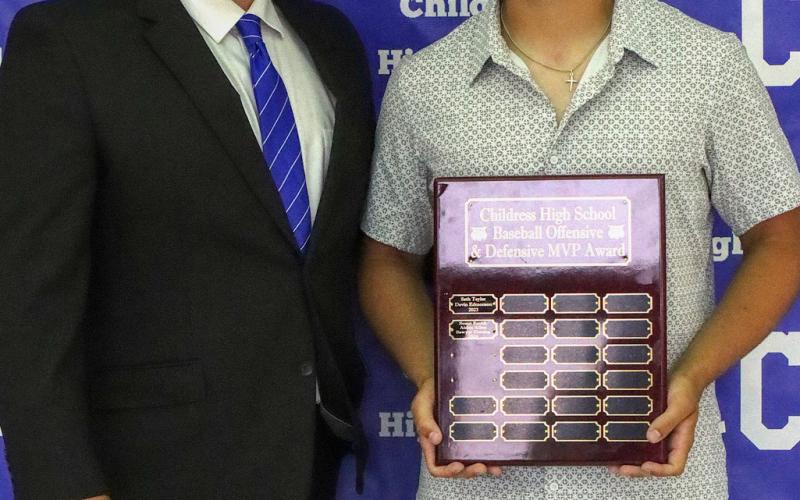 Colton Teichelman receives the Bobcat Baseball Offensive Most Valuable Player Award, presented by Bobcat Head Baseball Coach Trent Mayden.