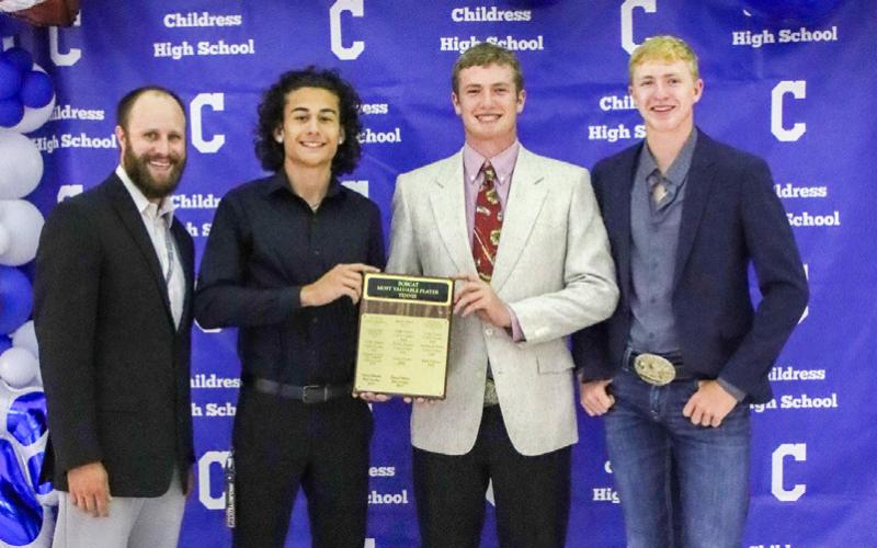 Afton Tipa receives the Bobcat Tennis Singles Most Valuable Player (MVP) Award and Cutter Bruce and Sterling Bruce receive the Bobcat Tennis Doubles MVP Award, presented by Athletic Director Bo Helm. From left: Helm, Tipa, C. Bruce, S. Bruce.