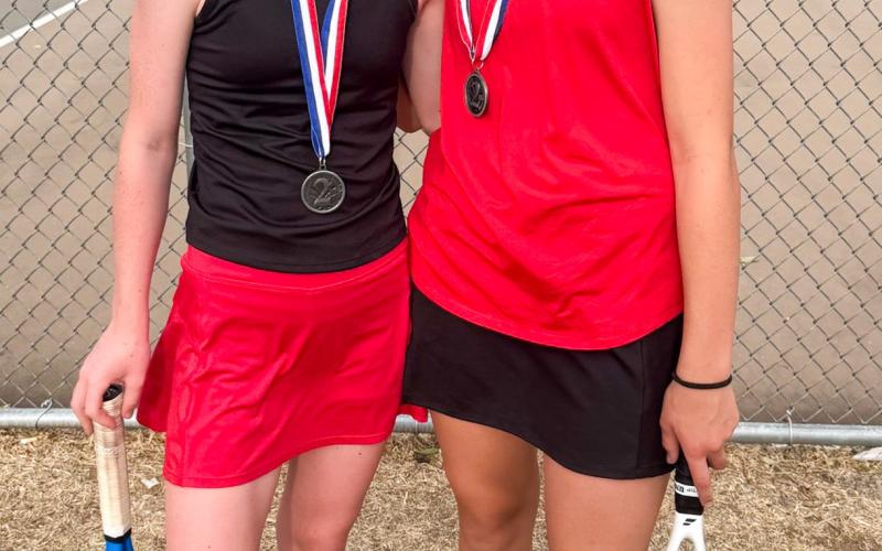Tatum Martin, left, and Quinn Roberson, second-place girls’ doubles.