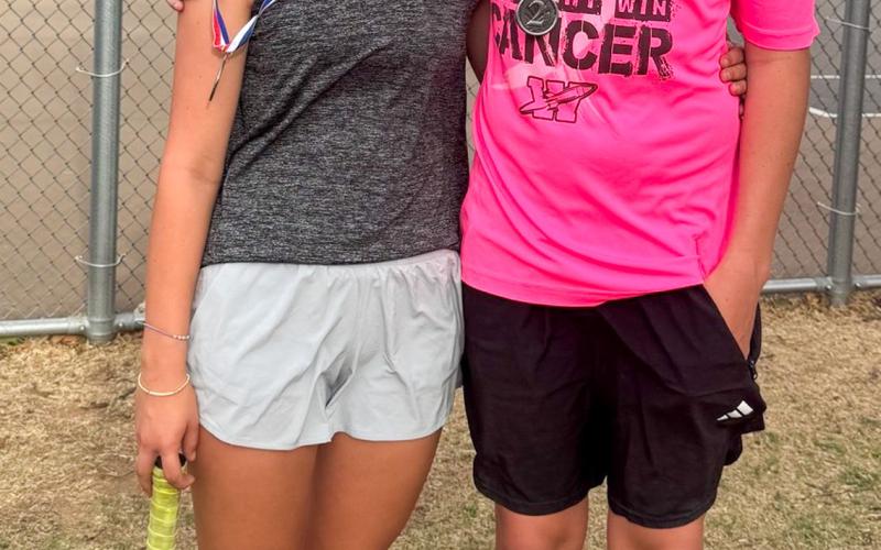 Ava Kate Inman, left, and Garrison Proffitt, second-place mixed doubles.