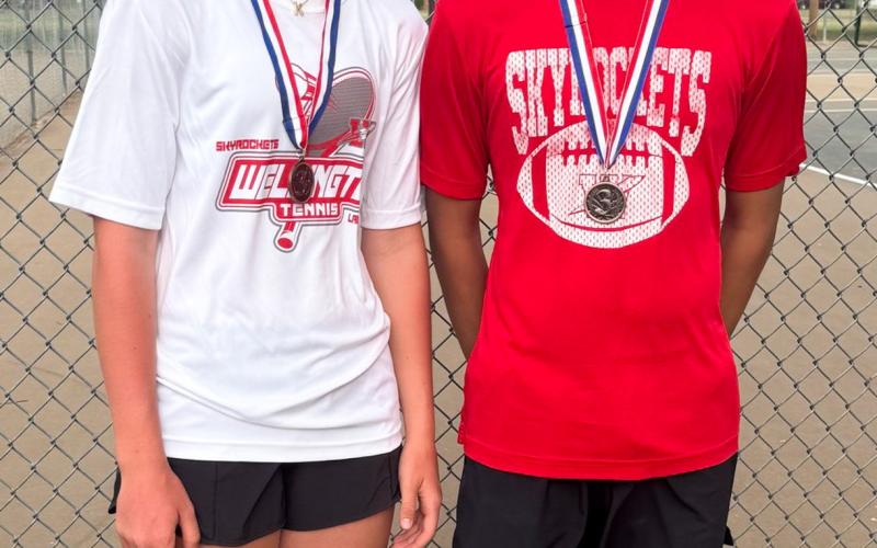 Kaesyn Kane, left, and Angel Segovia, third-place mixed doubles.