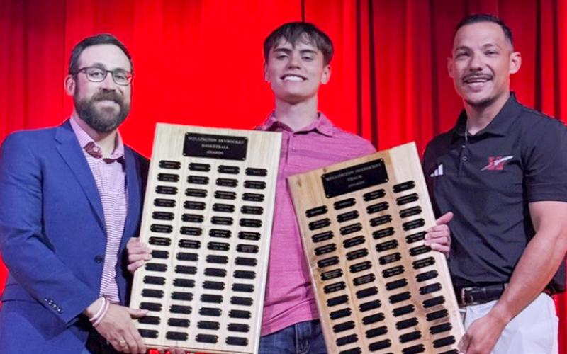 Wellington High School Freshman Jax Cantu receives the Boys’ Basketball Most Valuable Player Award, presented by Coach Colton Holmes, and the Boys’ Track Field Event Award, presented by Coach Jared Casas.