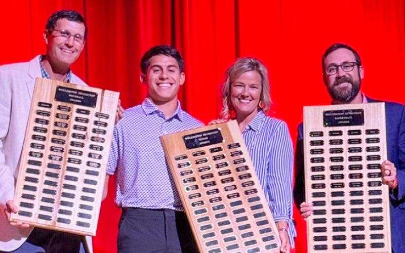 Wellington High School Senior Noah Cantu receives the Football Outstanding Back Award, presented by Athletic Director Coach Greg Proffitt, the Tennis Most Valuable Player Award, presented by Coach Amy Inman, and the Boys’ Basketball Defensive Award presented by Coach Colton Holmes.