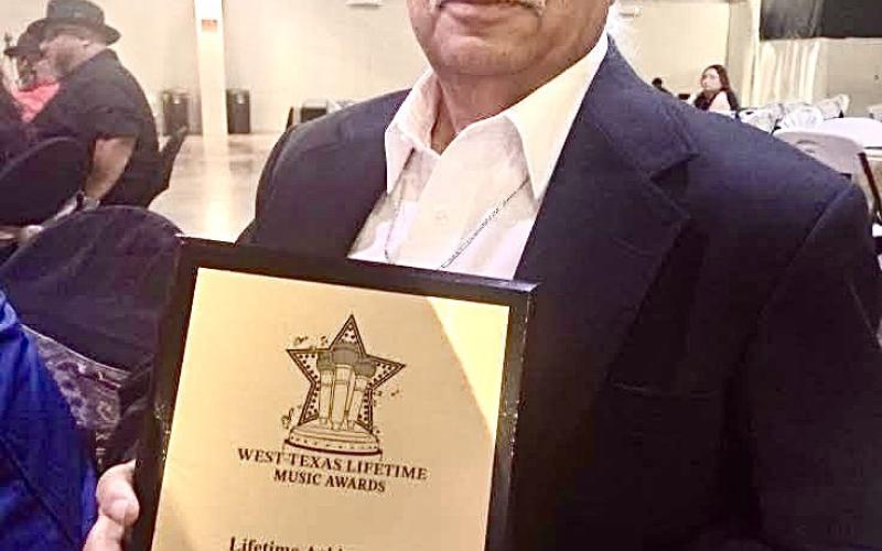 KLSR 105.3 radio personality Fernando “Cricket” Garcia is honored with the Lifetime Achievement Award at the Second Annual West Texas Lifetime Music Awards, organized by 22 Entertainment, Saturday, March 21 at the Prima Vista Event Center in Lubbock. Courtesy Photo