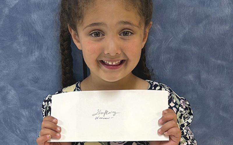 Wellington students accept lunch with parents cards