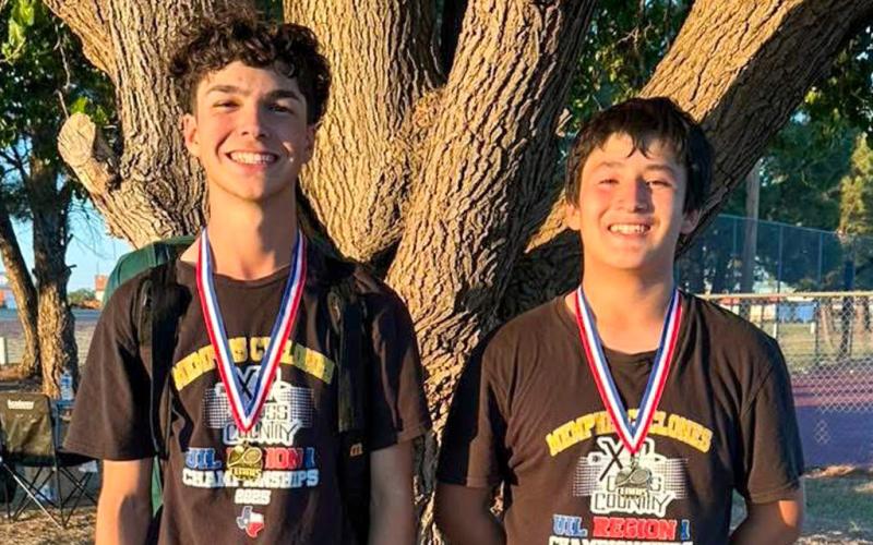 Memphis’ Kyler Robison, left, takes first place in the boys’ singles Monday, May 11 at the Memphis Tennis Tournament, followed by fellow Cyclone Leo Zarate, who finished second. MEMPHIS ISD