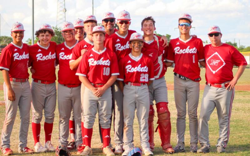 The Wellington Skyrockets notch another district win, celebrating a 13-0 shutout over the Quanah Indians Friday, April 10. Front row, from left: Colton Jernigan, Dahmian Salinas. Back row, from left: Alex Orozco, Easton Wischkaemper, Hunter Hedrick, Lawson Inman, Jax Heflin, Assistant Coach Greg Proffitt, Leo Granadoz, Cix Killian, Major Brown, Coach Jeff Anderson. SHAUNA SALINAS/THE RED RIVER SUN