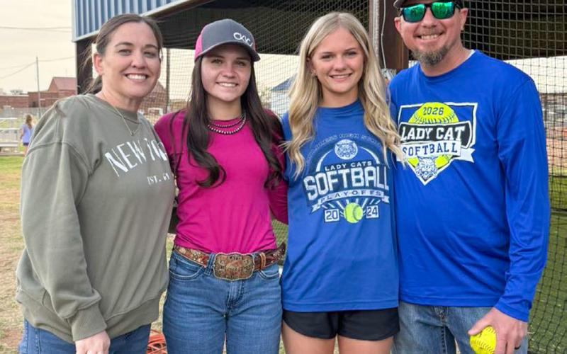 The Childress Lady Cat softball team enjoys a family and team dinner, hosted by parents of the players, Monday, March 23.