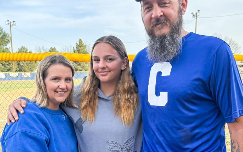 The Childress Lady Cat softball team enjoys a family and team dinner, hosted by parents of the players, Monday, March 23.