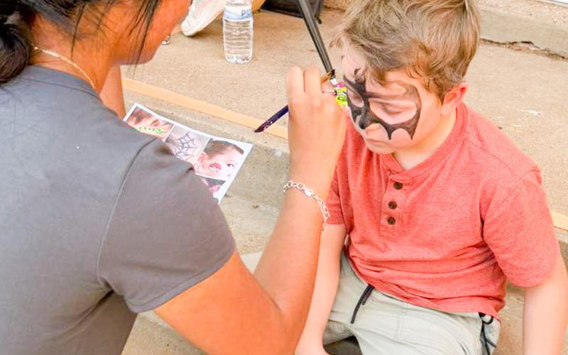 Austin Elementary School students celebrate reaching their Accelerated Reading (AR) goals with a party, including face painting and games, hosted by Memphis High School Family, Career and Community Leaders of America (FCCLA) members. MEMPHIS ISD