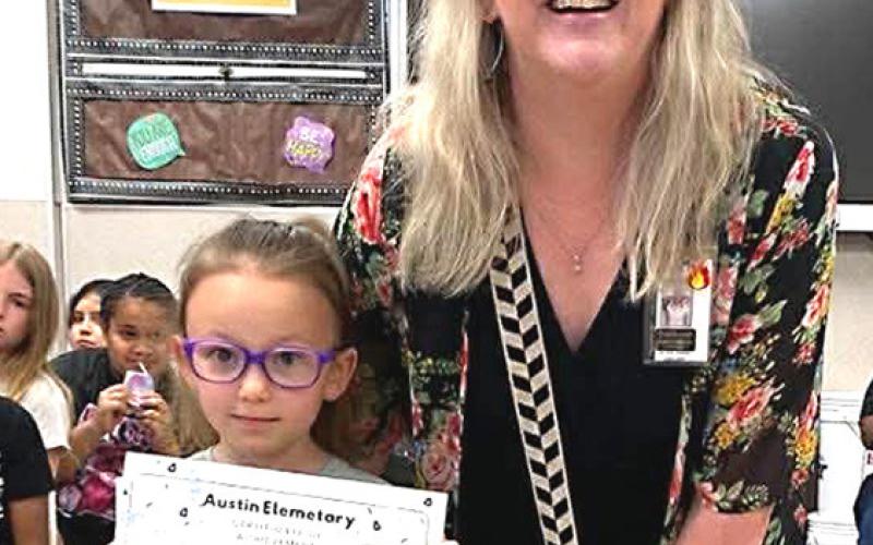 Penny Wars winner Paizleigh Martin brought triple in pennies for the Memphis Penny Wars.