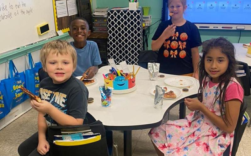 Second Grade won the Penny Wars and got a pizza party.