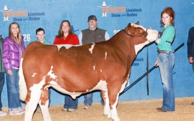 Bailey Page, a Wellington High School junior, travels to the Houston Livestock Show and Rodeo (HLSR) for spring break, placing second with her middleweight Simmental steer on Thursday, March 19 and earning a coveted sale spot at the HLSR sale scheduled for later this week. Wellington High School