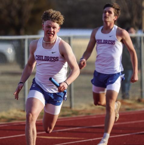 Kasen Geiser competes in the 4x100 meter relay, helping the Bobcats complete a second-place time of 45.81.