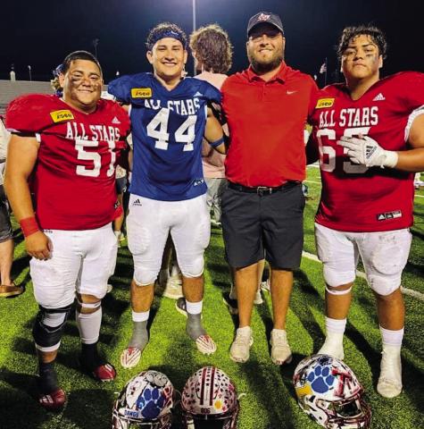 Red Team players Ramon Rodriguez, left, and Fabian Pina, right, celebrate a tie 14-14 game with Blue Team player Ethan Nevarez and Skyrocket Coach Klark Ashmore following the Saturday, June 1 ASCO All-Star 2024 Classic in Lubbock. Courtesy Photo
