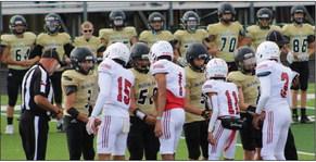 Anthony Ortiz (15), Brenden Garcia (1), TJ Salinas (11) and DeMarcus Lewis (3) serve as junior varsity Skyrocket captains for the Bushland game last Thursday. Wellington tied the Falcons 28-28, leaving the JV Rockets undefeated on the season with one tie game. The Red River Sun/Shauna Salinas