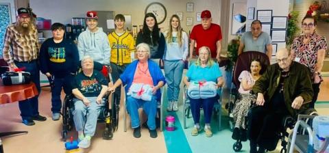 Members of the Wellington Junior High School Student Council Service Committee deliver 40 Operation Blanket Blessing gifts to Wellington Care Center residents Thursday morning, Dec. 21, prior to school dismissal for the Christmas holidays. Students distributing the blankets included Hunter Phipps, Alex Orozco, Lawson Inman, Ansylee Hansen and Anna Needham. Courtesy Photo