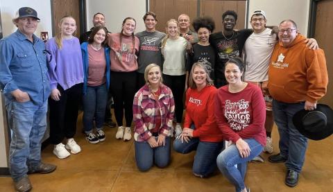 Youth gift Home Delivered Meal clients with Christmas joy