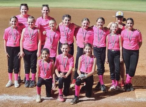 The first year for seven of the Lady Rockets to play softball, one mom described the girls as growing tremendously from game one to the last game and falling in love with the sport. Front row, from left: Juliet Solis, Raylie Sims, Peyton Roberson. Second row, from left: Blair Ward, Presley Kemp, Calleigh Henard, Quinn Roberson, Hadlee Patterson, Berkeley Ward, Cora Henard, Sara Morris. Back row, from left: Statistician Tana Roberson, Coach Molly Sims, Coach Lauren Patterson. 