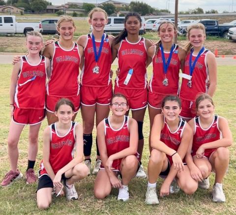 The Wellington Junior High School cross country team competes at the 2025 Badger Run Saturday, Sept. 13 at Amarillo College, medaling three competitors, including Claire Kane, Kaesyn Kane and Halle Hedrick.  Front row, from left: Jessalee Peters, Abbygale Torrez, Quinn Roberson, Evie Henard. Back row, from left: Taytum Martin, Ava Kate Inman, K. Kane, Priscilla Marentes, C. Kane, Hedrick. 