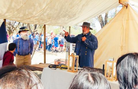 Assisted by organizer Darrell Colson, Steven Boone, reenacting Confederate General Robert E. Lee, explains life during the American Civil War to area students during the 2024 Living History Weekend at Powell Park in Wellington. Hosted by the Sons of Confederate Veterans Charles Goodnight Frontier Reg. Camp #2280, the 2025 event will again take place Friday-Saturday, Oct. 3-4 at Wellington’s Powell Park on Hwy 83. 