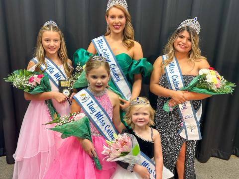 The 2025 Miss Cotton Country court gathers on the stage of Hollis High School Saturday night, Sept. 6. From left: Little Miss Cotton Country Madelynn McMahan, of Altus, Okla.; Tiny Miss Cotton Country Claire Martin, of Altus; Mini Miss Cotton Country Raine Matthews, of Elk City, Okla.; Miss Cotton Country Harlee Gomez, of Wellington; and Teen Miss Cotton Country Raelea Davila, of Wellington.  