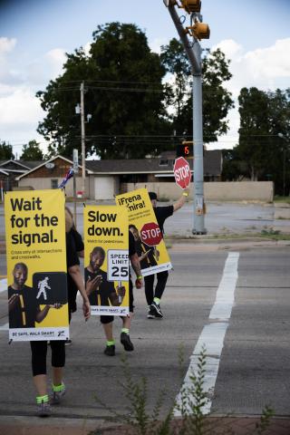 During the deadliest month of the year for pedestrians, the Texas Department of Transportation targets areas of high pedestrian activity and previously reported pedestrian crashes with street teams of “walking billboards,” which display key safety messages for drivers and pedestrians, Monday, Oct. 6 in Childress. 