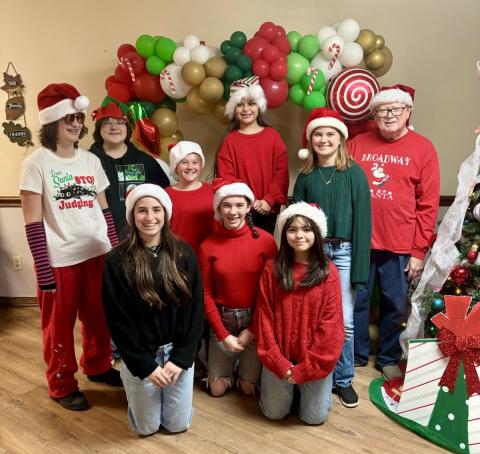 Monson Music Studio students perform at Childress Healthcare Center and Cottage Village of Childress Friday, Dec. 19, performing 19 Christmas selections. From left: Remi Jones, of Childress, guitar; Lani Wyatt, of Paducah, guitar; Saylee Ochoa, of Childress, guitar and vocals; Kinzlee Willis, of Childress, vocals; Libby Sanford, of Childress, vocals; Avery Lopez, of Childress, vocals; Emmelia Butler, of Quanah, guitar and vocals; Chelsea Harms, of Wellington, violin and vocals; and Monson Music Studio owner