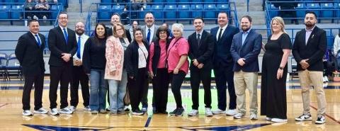 The Childress Bobcat Basketball Program donates over $850 to We Can Care, a local nonprofit organization aiding Childress County cancer patients, Tuesday, Jan. 20 during the Childress vs. River Road matchup at Bobcat Den in Childress. Funds were obtained through the purchase of $1 paper sneakers during Coaches vs. Cancer Suits and Sneakers Week, a nationwide event when basketball coaches across the country unite for a common cause—ending cancer as we know it.