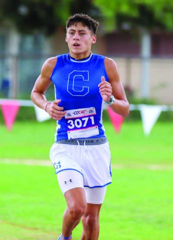 Childress’ Gavin Navarrette medals a 15th-place finish with a time of 21:43.
