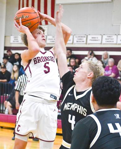 Memphis’ Ethan Perkins and Andres Rodriguez block out the Clarendon Broncos in a 62-45 win Tuesday, Jan. 13 in Clarendon, coming back off a two-game losing streak. Adelita Elam
