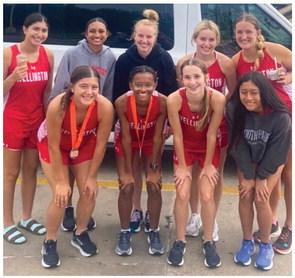 Lady Rockets medal at Burkburnett  Cross Country Jamboree