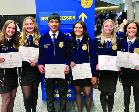 Memphis High School FFA students receive their Lonestar Degrees, the highest degree the state association can bestow upon a member, at the 95th Texas FFA State Conference Tuesday, July 10- Friday, July 14 in Dallas. From left: Photo Courtesy of Memphis ISD