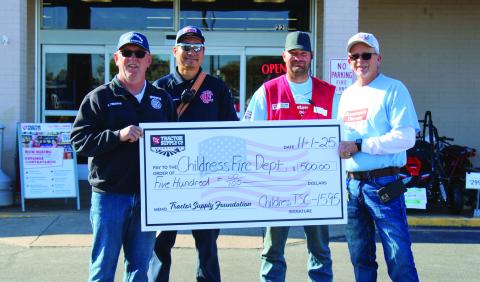 Tractor Supply Co. donates $500 to the Childress Fire Department during Hometown Heroes, an annual event honoring the nation’s military service members, veterans and first responders, Saturday, Nov. 1. The Red River Sun/Elizabeth Tanner
