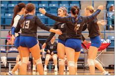Lady Cats soar past Eagles