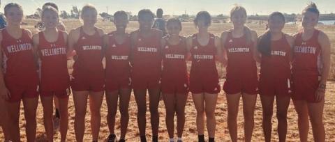 The Wellington Lady Rocket cross country team finishes as the first-place team champion during the Elk City Invitational Saturday, Sept. 30 in Elk City, Okla. Individual medalists included Addy Mock, sixth place; Harlee Gomez, 10th place; Sabrina Segovia, 12th place; and Presley Kane, 17th place. They are coached by Cade Brown. From left: Addalyn English, Elli Ouellette, Kane, Ayz’lin Menefield, Alyssa Lewis, Segovia, Mock, Gomez, Leslie Orozco and Ceighley Killian. Courtesy Photo