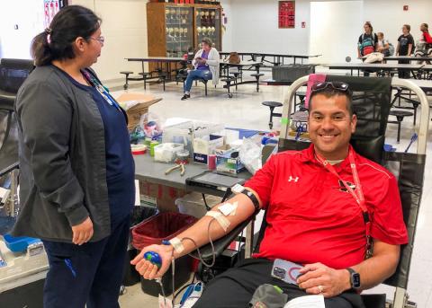 Wellington High School (WHS) Principal Jermaine Cantu donates during Coffee Memorial Blood Center’s Blood Drive Thursday, Oct. 9 in the WHS commons. The Red River Sun/Bev Odom