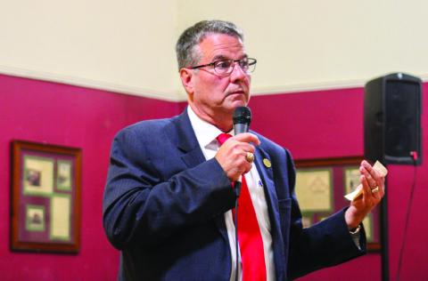 Sen. Charles Perry addresses a crowd of over 50 individuals last Friday, Sept. 9 at The 501 Winery during a town hall meeting in which he solicited feedback on issues of vital importance before beginning the upcoming 88th Regular Legislative Session. The Red River Sun/Elizabeth Tanner