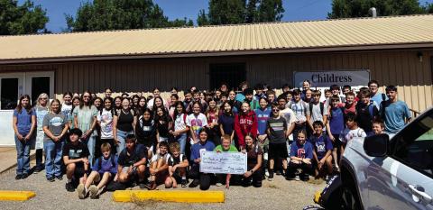 Childress Junior High School Leadworthy students present a $200 check to Childress Meals on Wheels Tuesday, May 20. Students raised funds by charging staff and students $1 to wear a hat on Friday, May 9. Childress Junior High School
