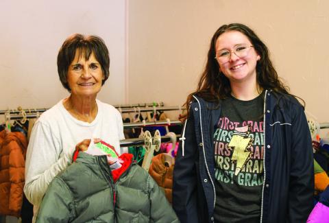 Childress County Christmas Sharing Board Members Raenell Smith, left, and Haley Richardson, right, prepare for the 2024 holiday season, which met the needs of 50 families, 96 children, 18 high-school students and 47 elderly and disabled, as well as Childress Healthcare Center and Cottage Village Assisted Living residents. The Red River Sun/Elizabeth Tanner