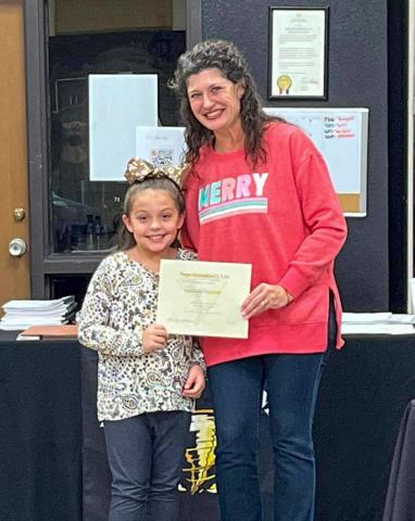 Austin Elementary School third-grader Aaliyah Chacon accepts the Superintendent’s List designation from Memphis Independent School District (ISD) Board of Trustees President Sarah Cook. To make the Superintendent’s list, students must have the highest grade point average in the third-12th grade, along with no absences, tardies or office referrals. Photos Courtesy of Memphis ISD