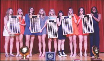 Wellington Lady Rockets, including Briley Waters, left, Kaitlin Bawcom, Audrey Jones, Madeleine Kane, Presley Kane, Addy Mock, Charley Wilbur, Summer Owens and Asia Shrubs, accept special recognition during the 2023 Athletic Banquet. The Red River Sun/Bev Odom