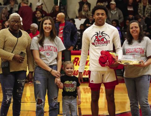 Wellington High School honors its basketball seniors during a special ceremony Tuesday, Feb. 7 prior to the Wellington Lady Rocket versus Clarendon Lady Bronco match. Skyrocket Jordan Nation is the son of Tyran Lewis and April Lindsay, brother of Taylor Souder and uncle of Whitley Souder. He has played varsity basketball for the Rockets for four years. Lukas Wilbur Photography